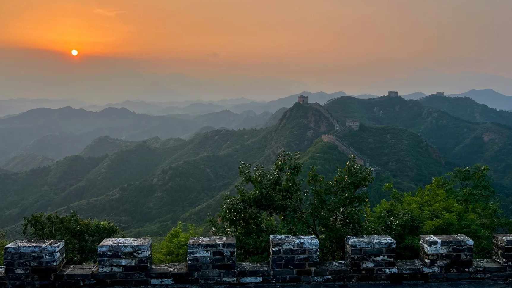 Jinshanling Great Wall offers more challenging terrain and original features